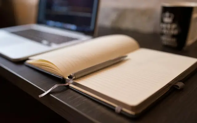 Open ledger notebook on a desk